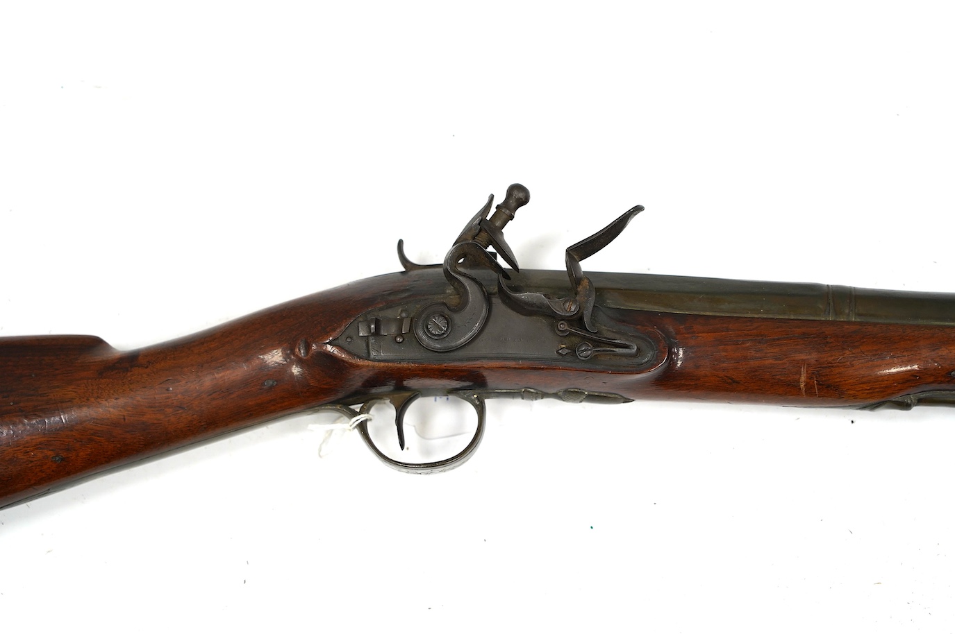 A good brass barrelled flintlock blunderbuss by Goodwin of London, c.1820, port octagonal brass barrel, Birmingham proofed, fitted with spring bayonet, signed lock with sliding safety bolt, engraved brass furniture, barr